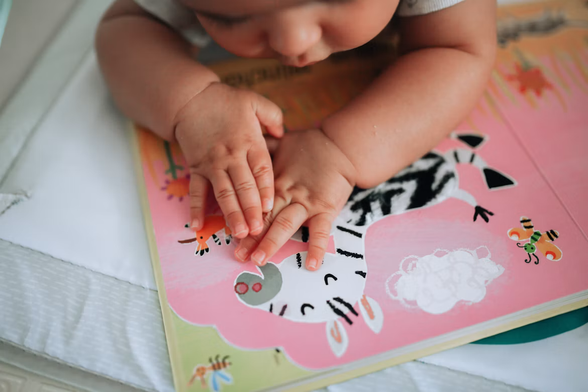 baby reading a book
